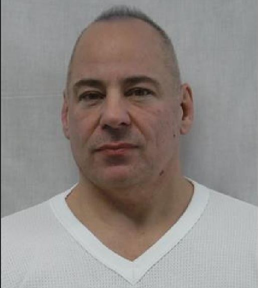 POWELL is described as a white male, 54 years of age, 5'8" (173 cm) 260 lbs (118 kg) with brown hair and green eyes.