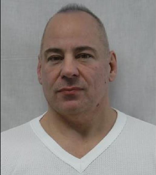 POWELL is described as a white male, 54 years of age, 5'8" (173 cm) 260 lbs (118 kg) with brown hair and green eyes.